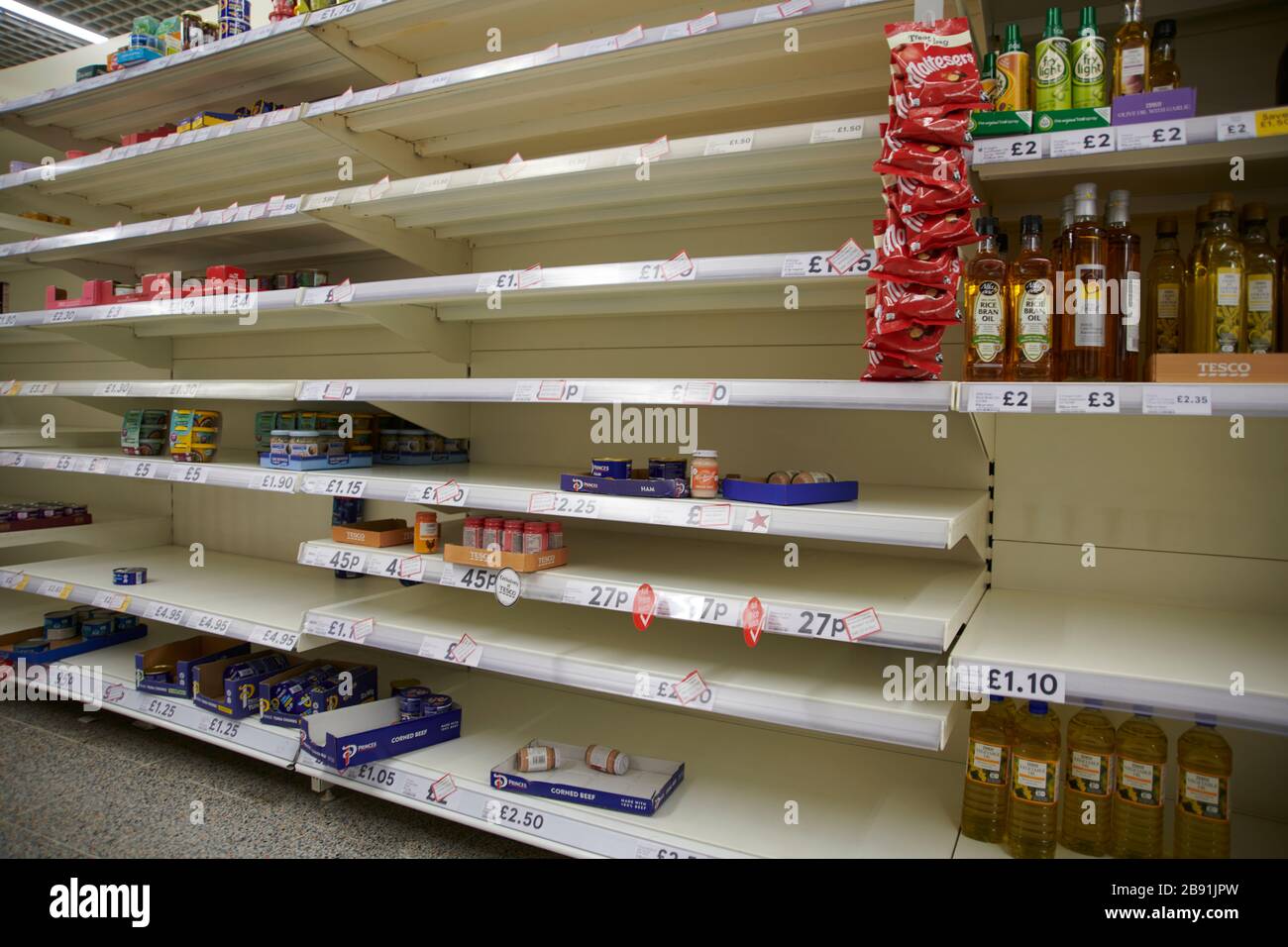 Empty shop shelves because of panic buying and holding food Coronavirus