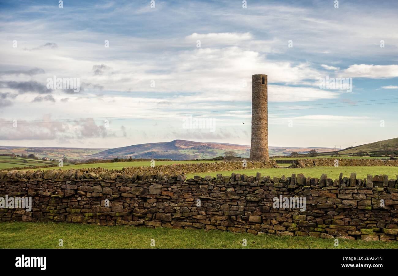 Stunning view of Beamsley Beacon from Addingham Moorside with a railway chimney shaft in the foreground, looking towards the Yorkshire Dales, UK Stock Photo