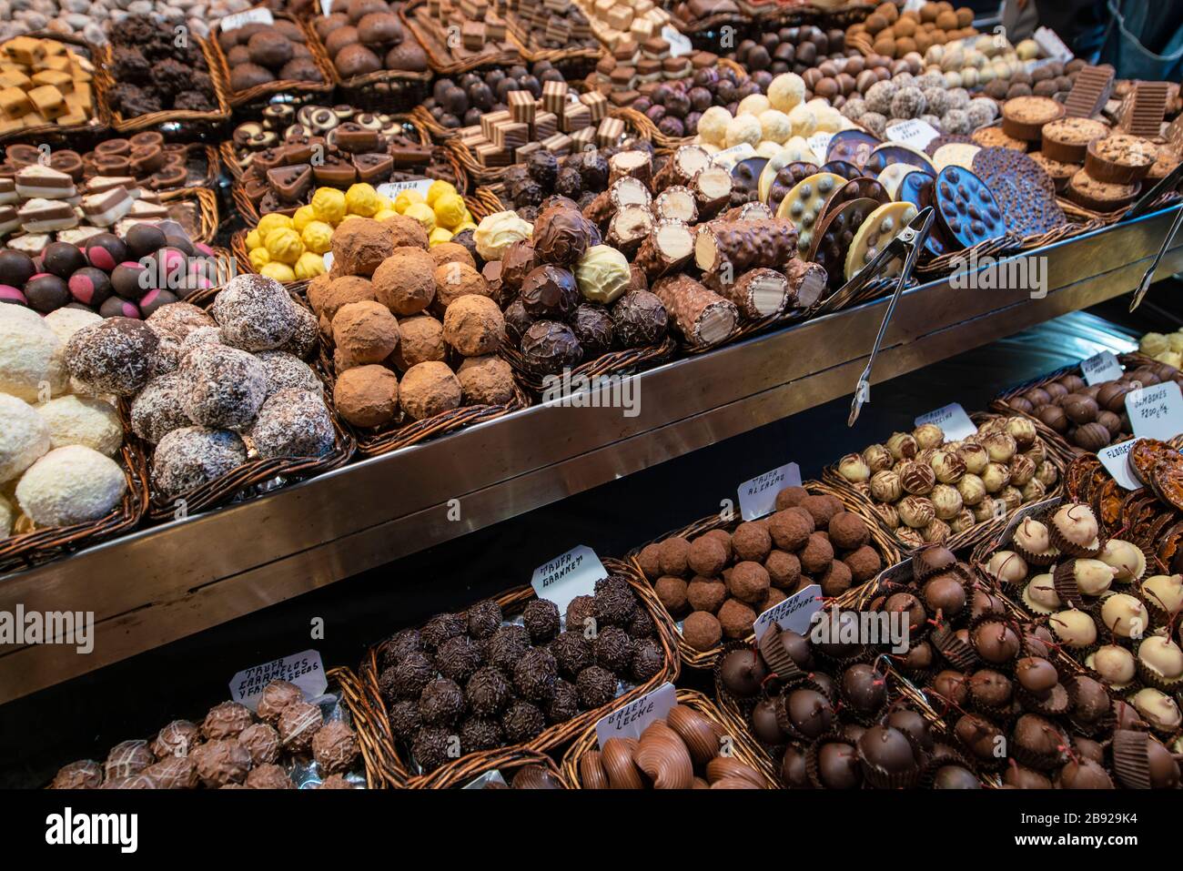 Chocolate truffles and pralines at the Boqueria market in Rambla Stock Photo