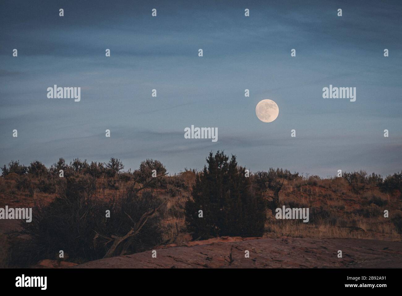 Full moon over Utah's landscape Stock Photo Alamy