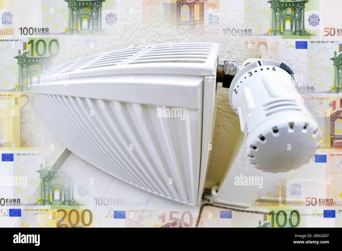 PHOTOMONTAGE, heating and bank notes, heating costs, FOTOMONTAGE, Heizung und Geldscheine, Heizkosten Stock Photo