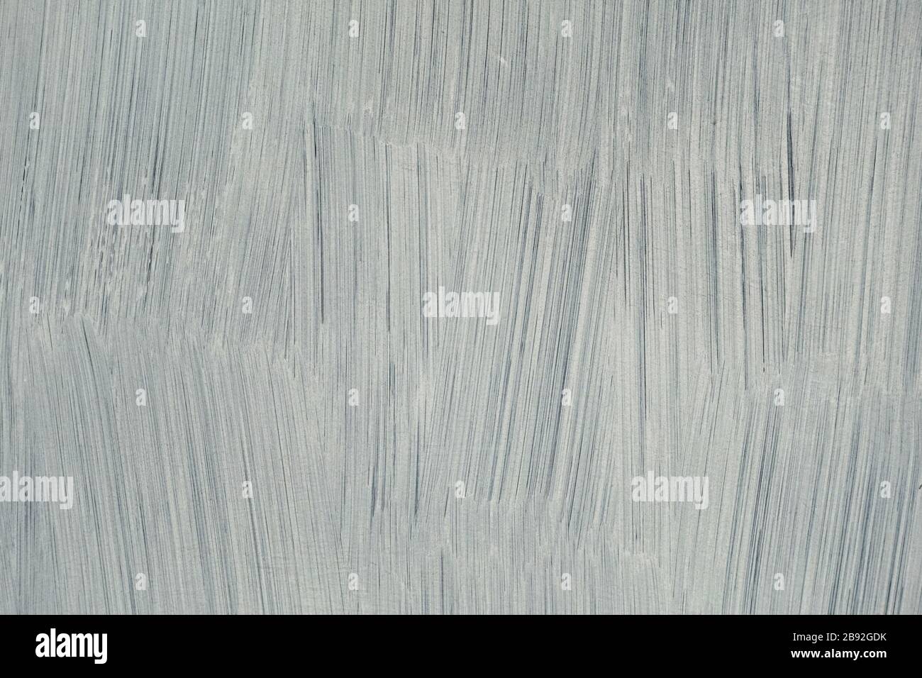 White paint brush strokes on glass surface. Abstract background. Stock Photo