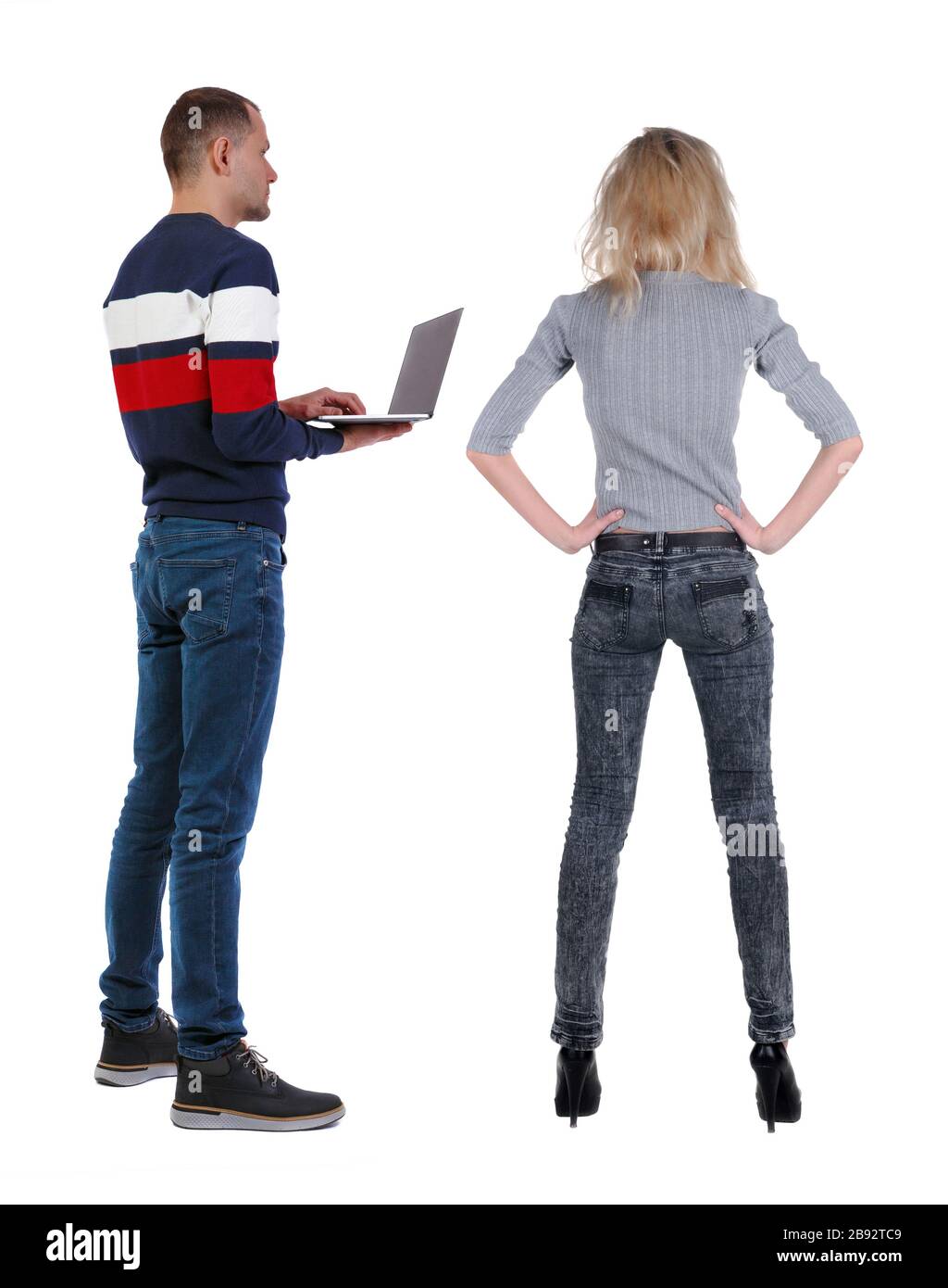 Back view couple in sweater. beautiful man and woman. Rear view people ...