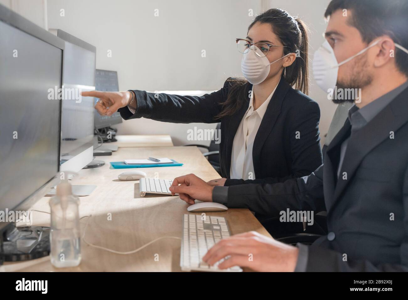 Coronavirus Office workers with mask for corona virus. Business workers wear masks to protect and take care of their health. Stock Photo