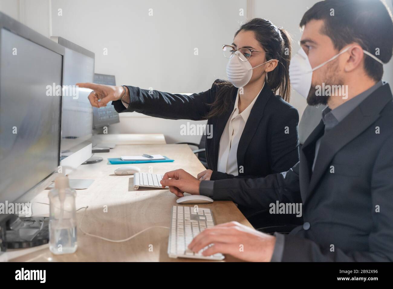 Coronavirus Office workers with mask for corona virus. Business workers wear masks to protect and take care of their health. Stock Photo