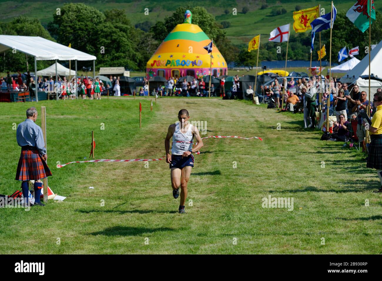 Runners at the Highland games of Lochearnhead, near Crieff, Scotland. Stock Photo