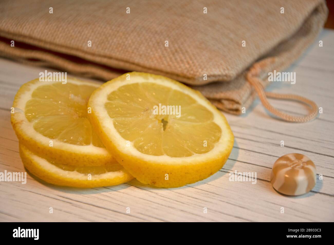 Close up of lemon slices, hessian bag Stock Photo