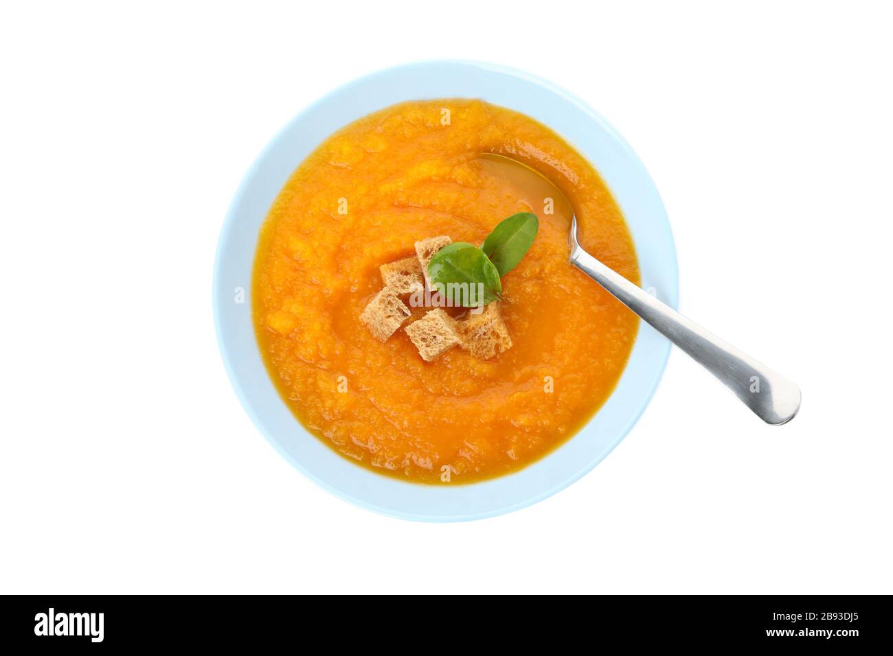 Pumpkin cream soup isolated on white background Stock Photo - Alamy