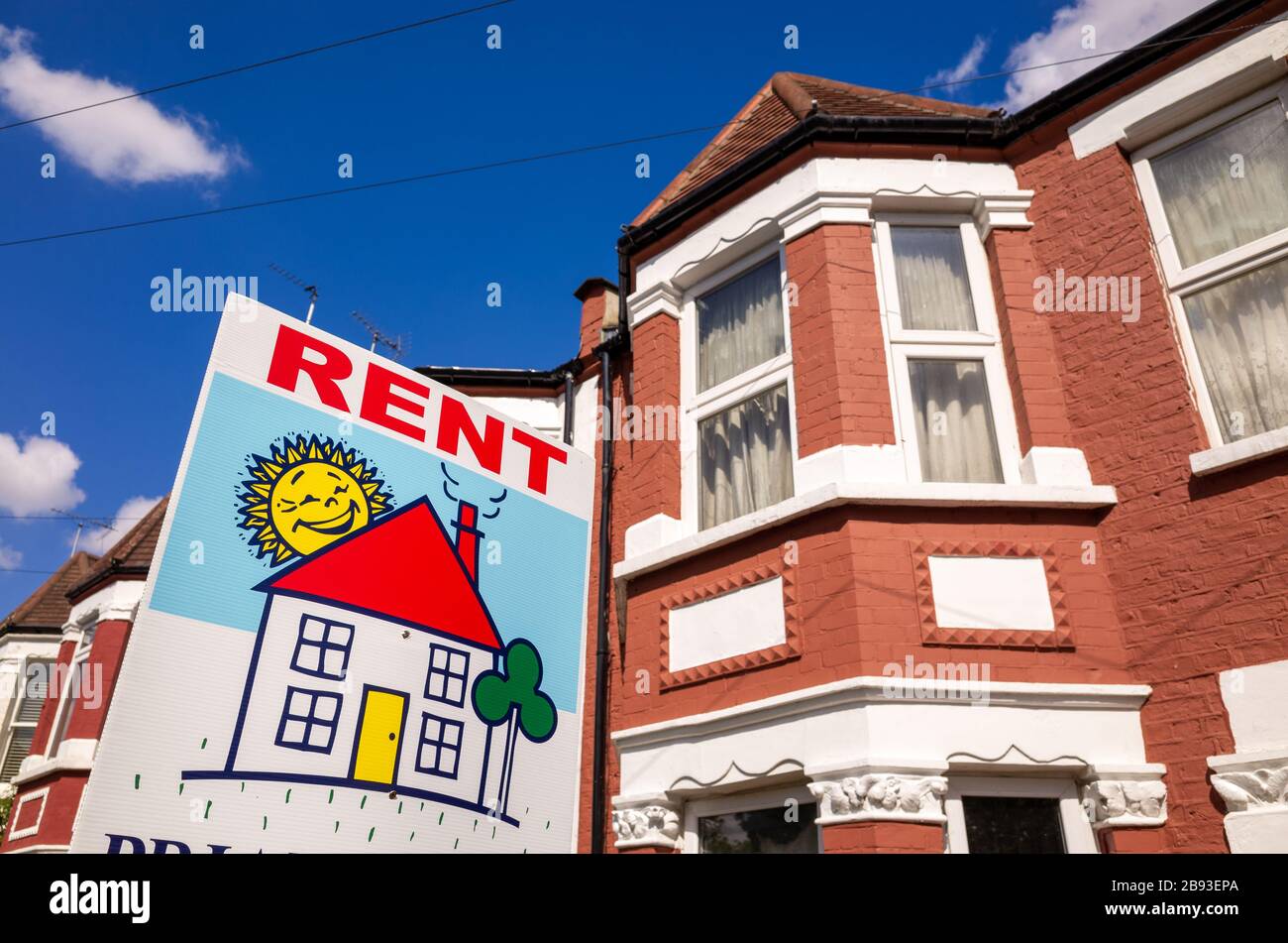 Estate agent rent sign outside terraced house, UK, London Stock Photo