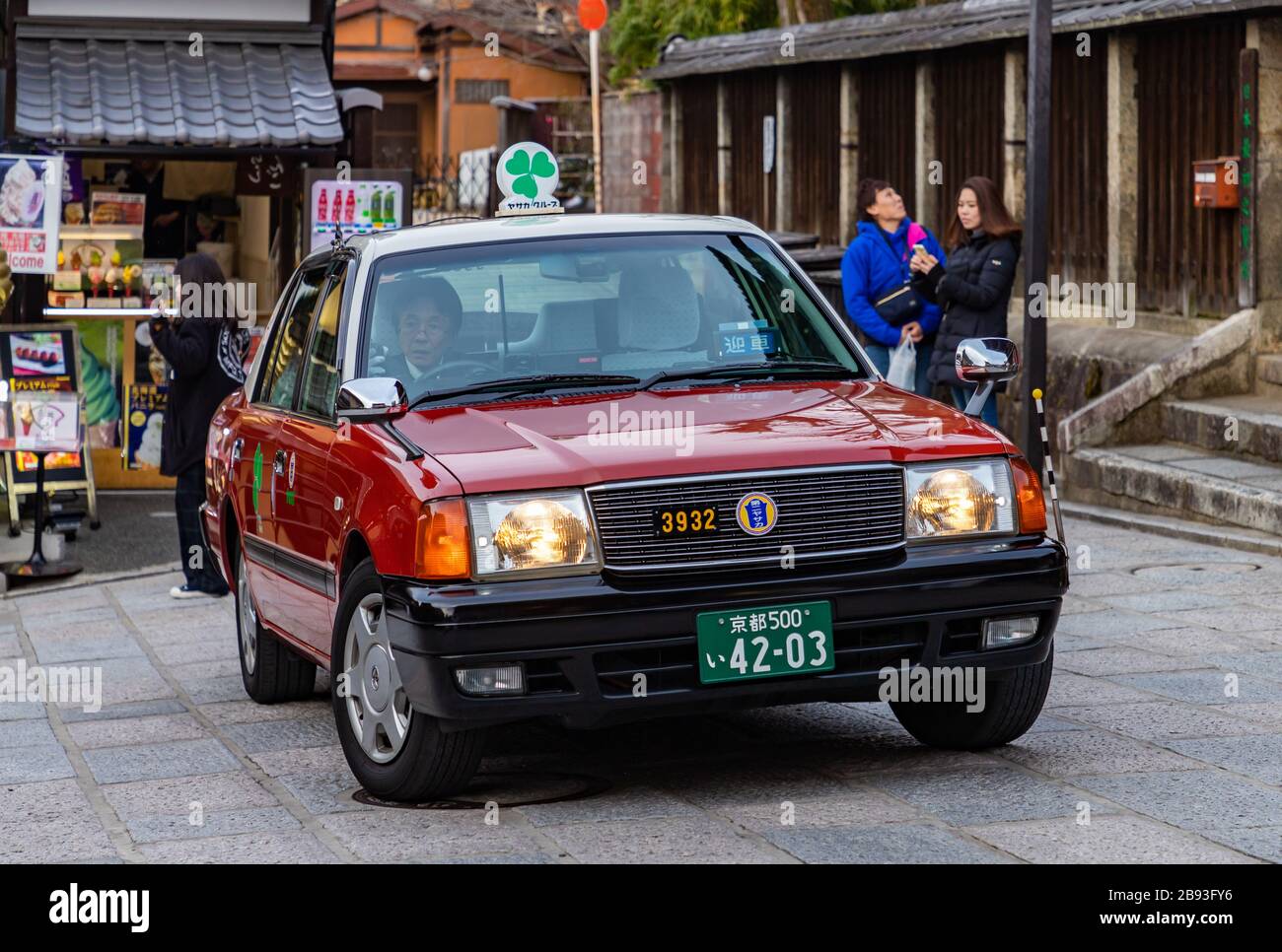 A picture of a taxi parked near the Hōkan-ji Temple, also known as Yasaka-no-Tou. Stock Photo