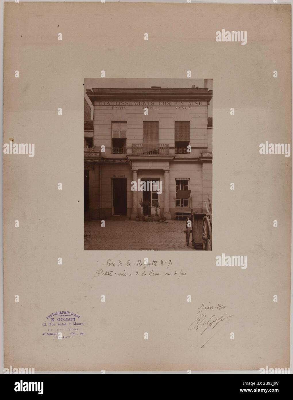 Rue de la Roquette # 71. / Little Court front view. Front of Ebstein institutions elder, to an inner couor, 11th arrondissement, Paris. Gossin, E. Rue de la Roquette n°71. / Petite de la Cour vue de face. 'Façade des établissements Ebstein aîné, vue d'une couor intérieure, 11ème arrondissement, Paris'. en 1910-06-1910-06. Paris, musée Carnavalet. Stock Photo