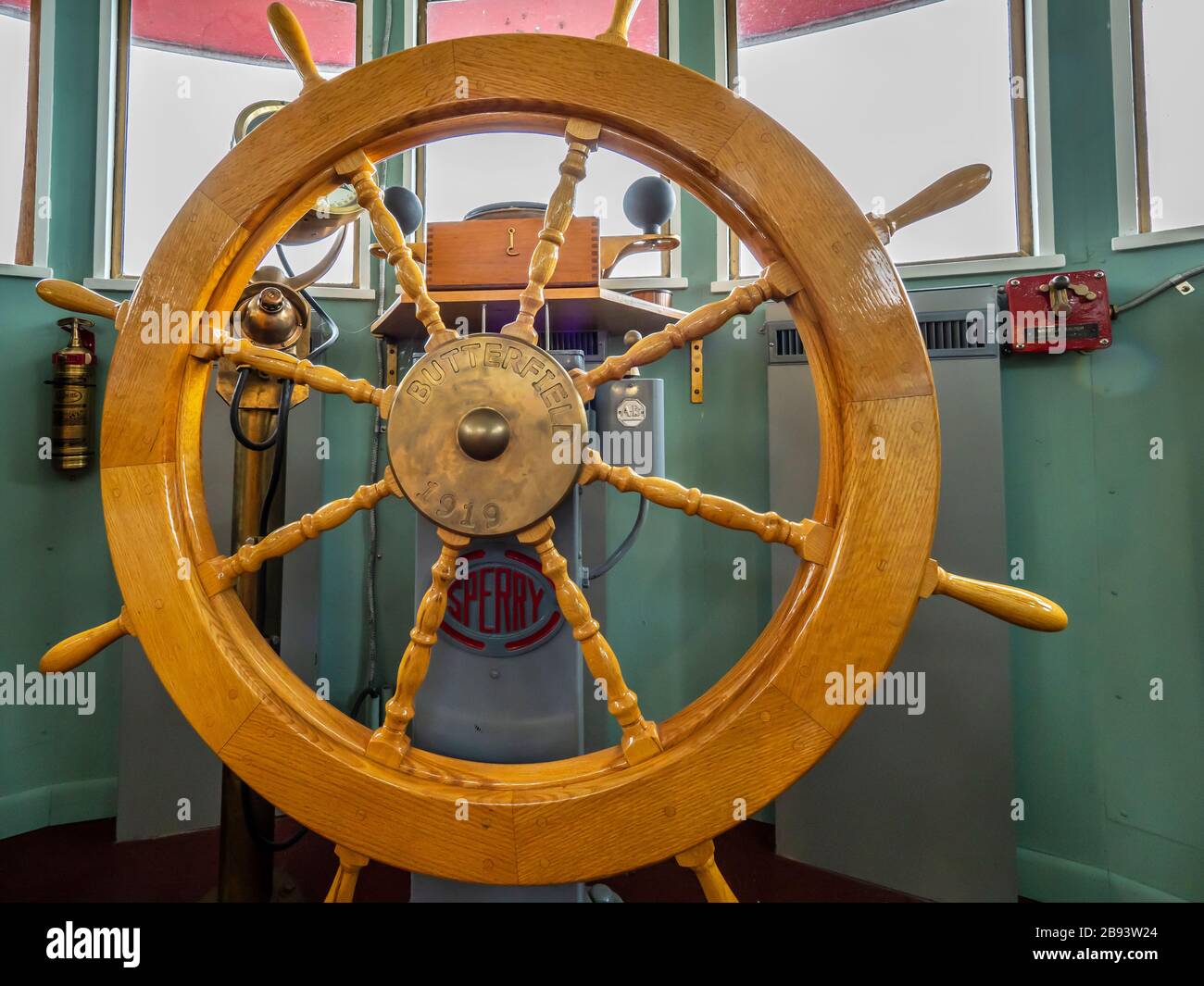 Ship's Wheel Against Water Stock Photo by mrdoomits