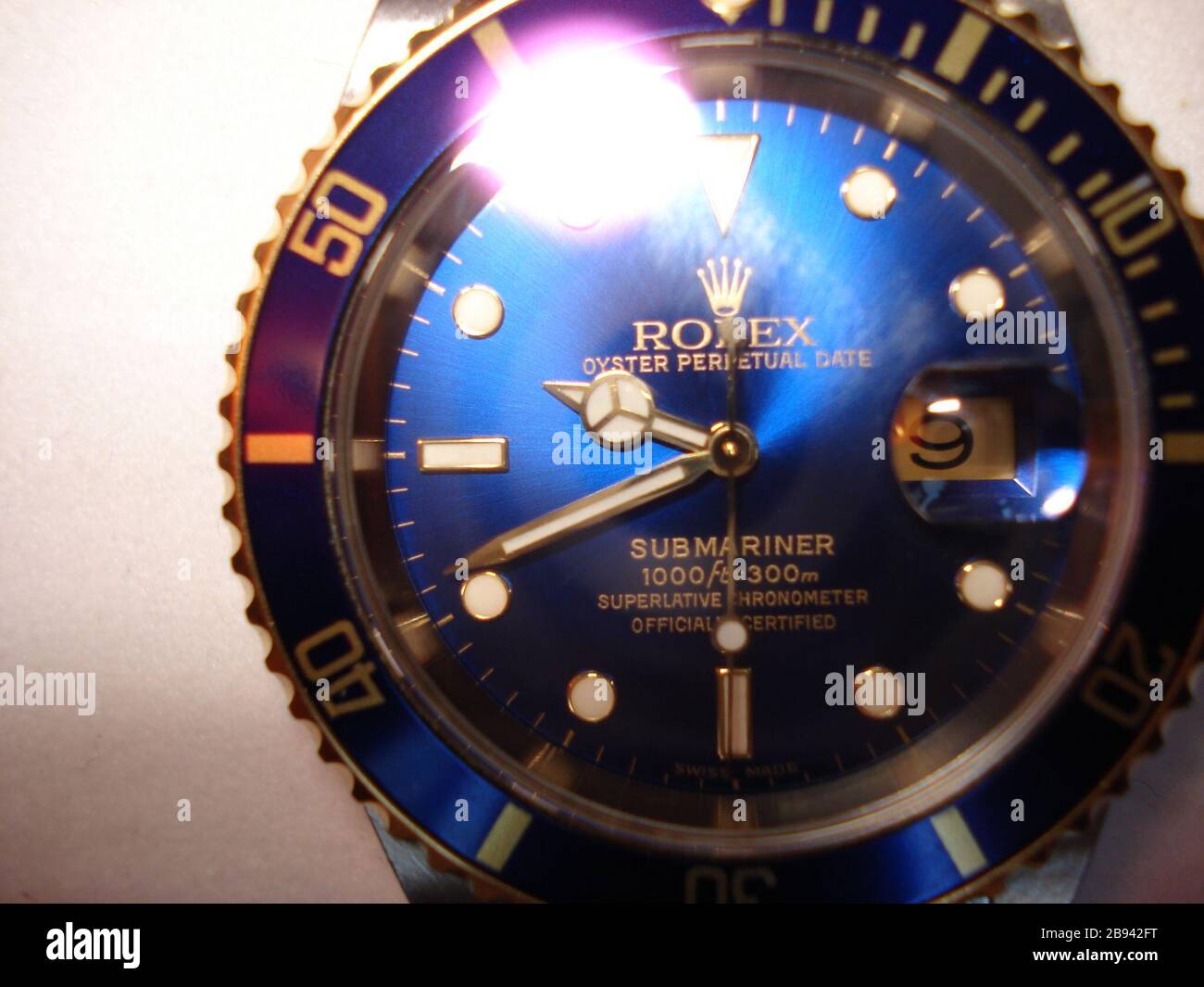 English: A Rolex Oyster Perpetual Date Submariner watch; 12 September 2007  (according to Exif data); Own work of English Wikipedia user  Eternalsleeper; User:Eternalsleeper Stock Photo - Alamy