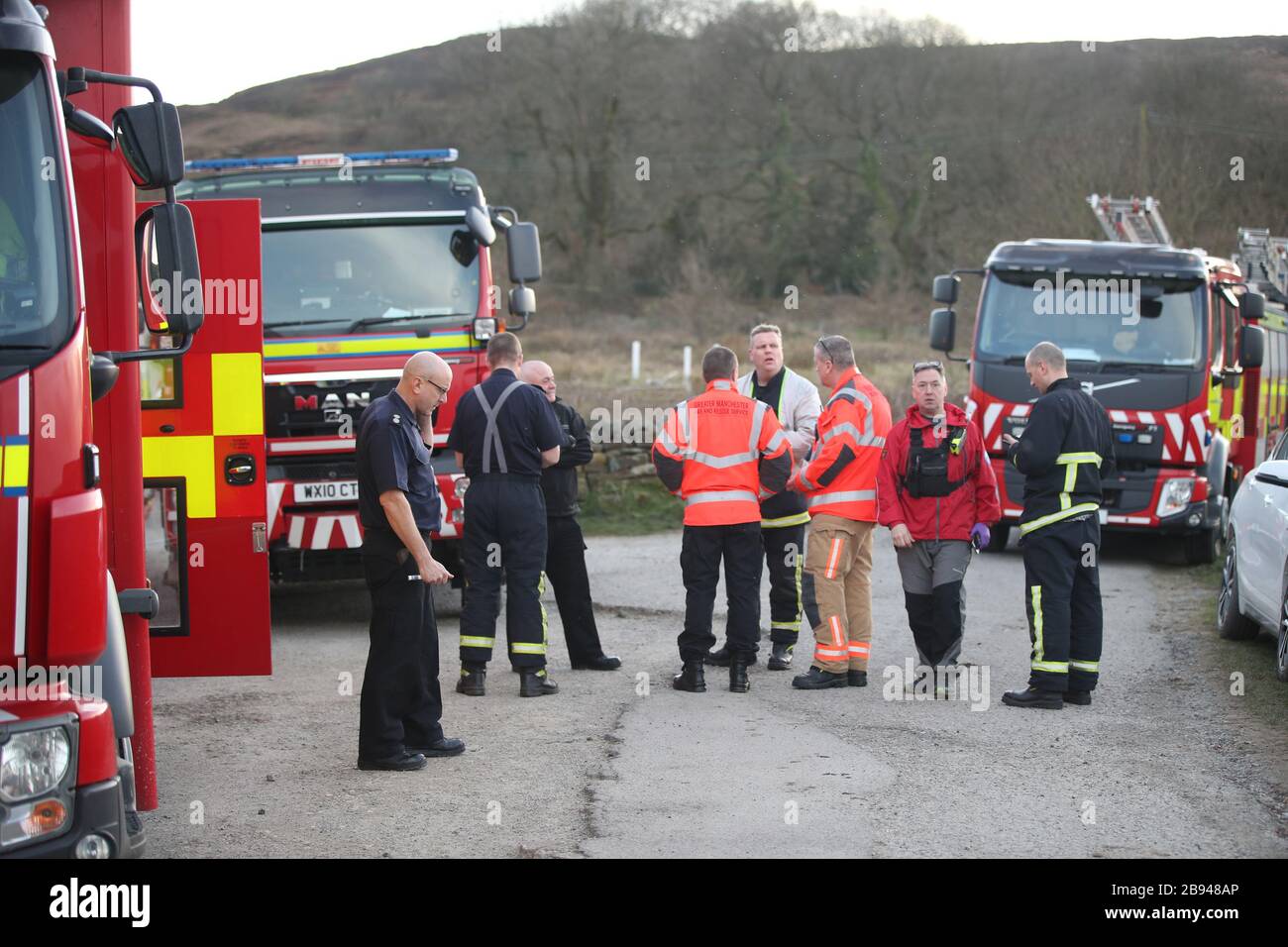 Firefighters at the scene of a moorland fire near Deer Hill Reservoir in Marsden. Stock Photo