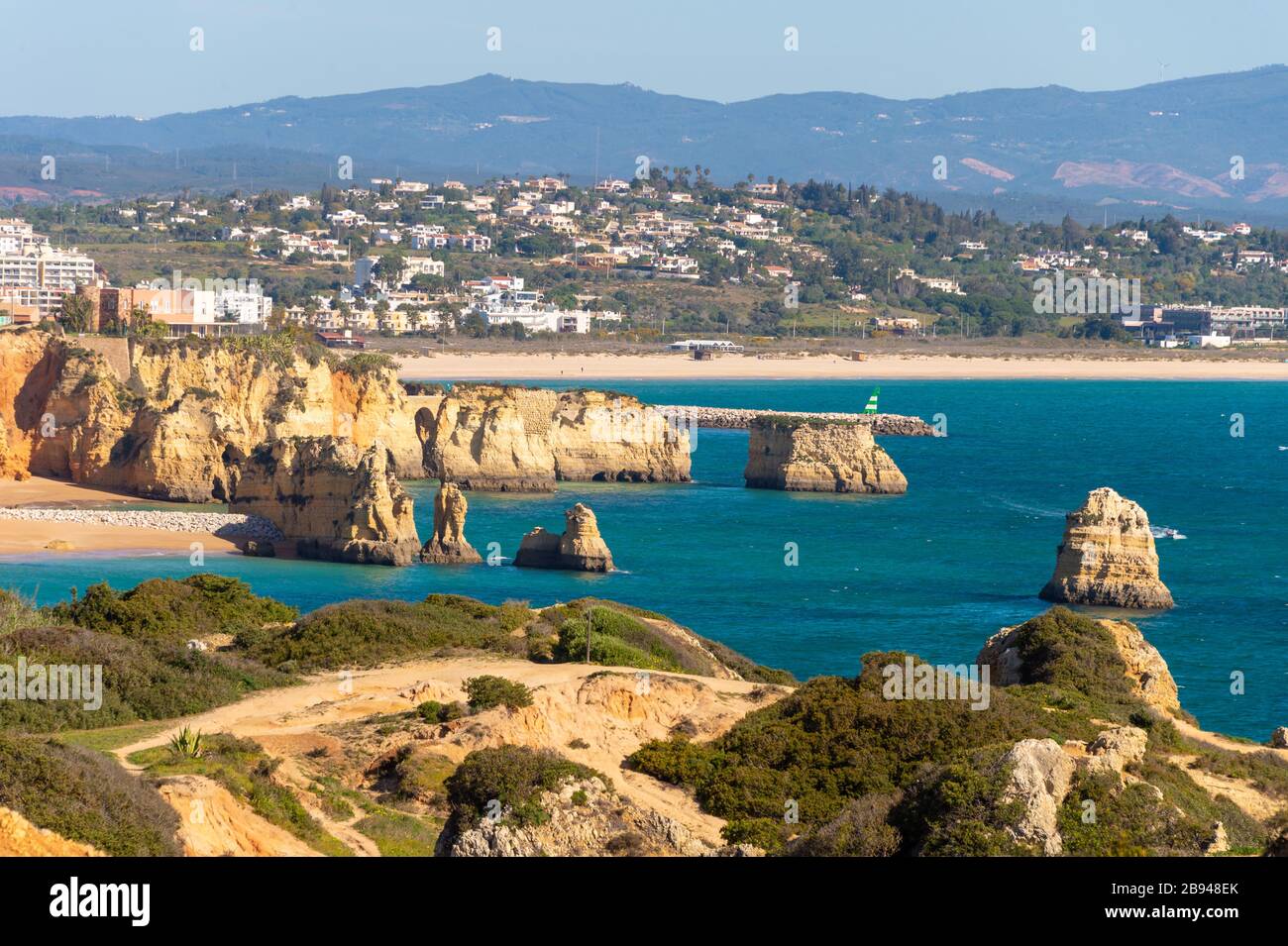 Lagos, Portugal - 7 March 2020: View of Lagos coastline in Portugal, Dona Ana Beach in the distance Stock Photo