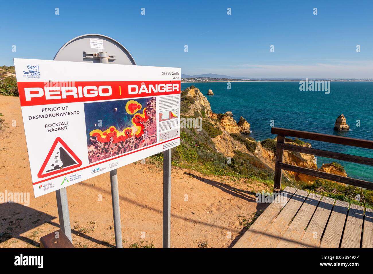 Lagos, Portugal - 7 March 2020: Rockfall hazard danger sign at Praia do Camilo beach Stock Photo