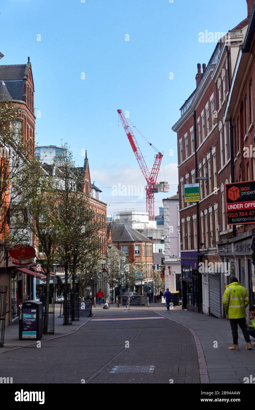 View East along Carlton Street Nottingham towards stoney street with a crane being used in the urban regeneration of the Cities Southern Gateway Stock Photo