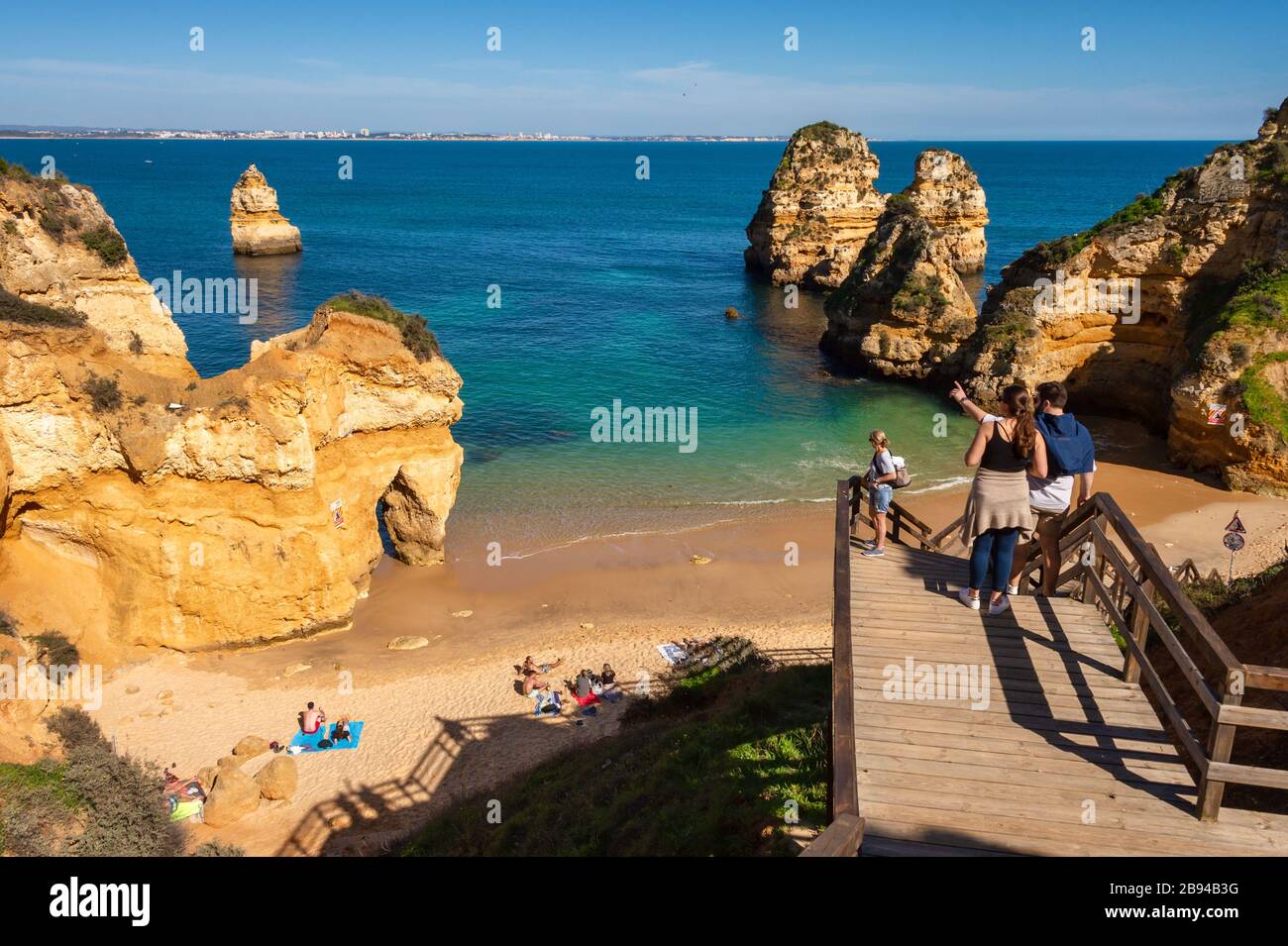 Lagos, Portugal - 7 March 2020: People going to Praia do Camilo Beach Stock Photo