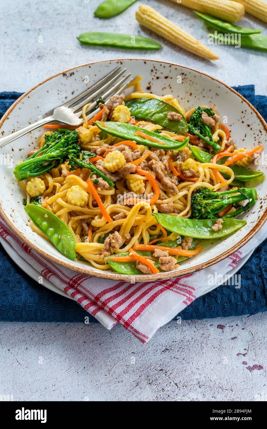 Pork noodle stir-fry with vegetables Stock Photo - Alamy