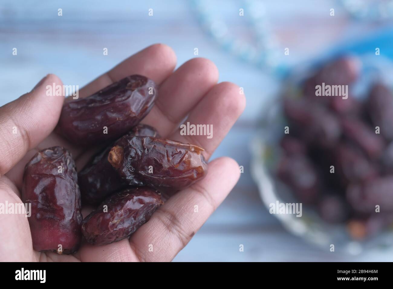 top view of date fruit on man hand  Stock Photo