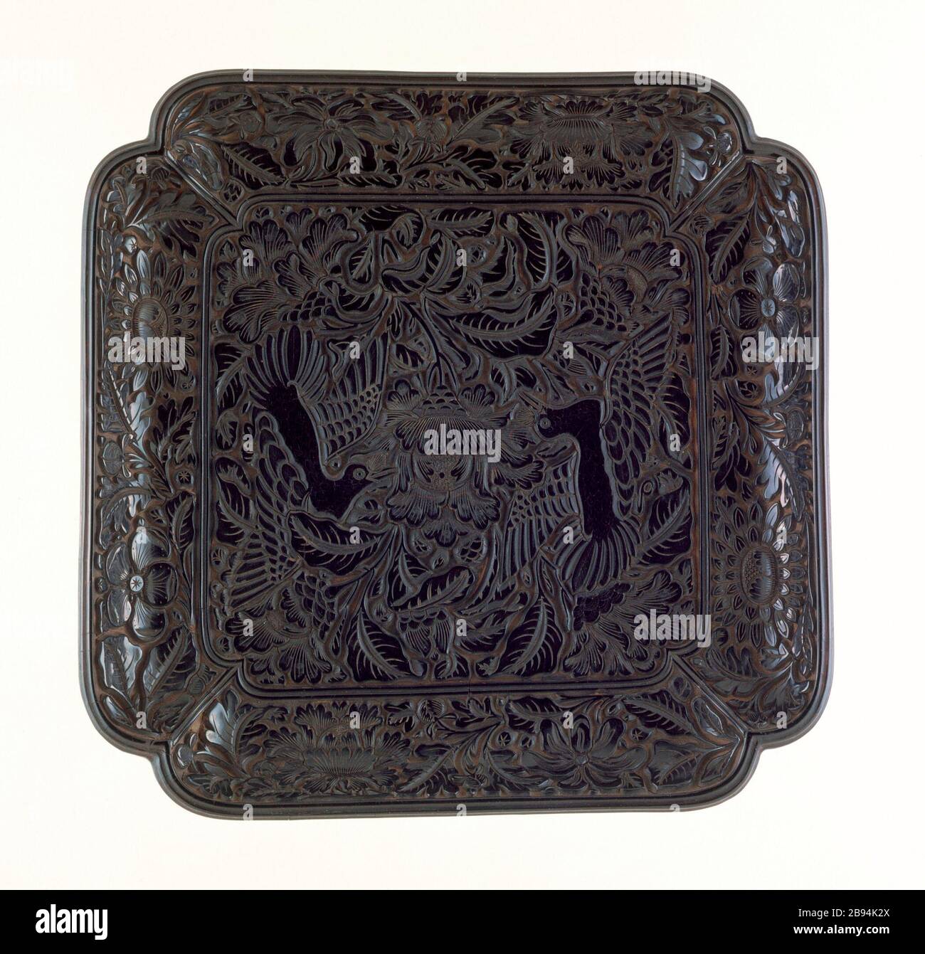 'Square Tray (Fang Pan) with Pair of Birds in Peonies (image 1 of 2); English:  China, Chinese, early Ming dynasty, about 1368-1450 Furnishings; Serviceware Carved black lacquer on wood core Gift of Mr. and Mrs Richard W. Chan (M.87.204.2) Chinese Art; between circa 1368 and circa 1450 date QS:P571,+1500-00-00T00:00:00Z/6,P1319,+1368-00-00T00:00:00Z/9,P1326,+1450-00-00T00:00:00Z/9,P1480,Q5727902; ' Stock Photo