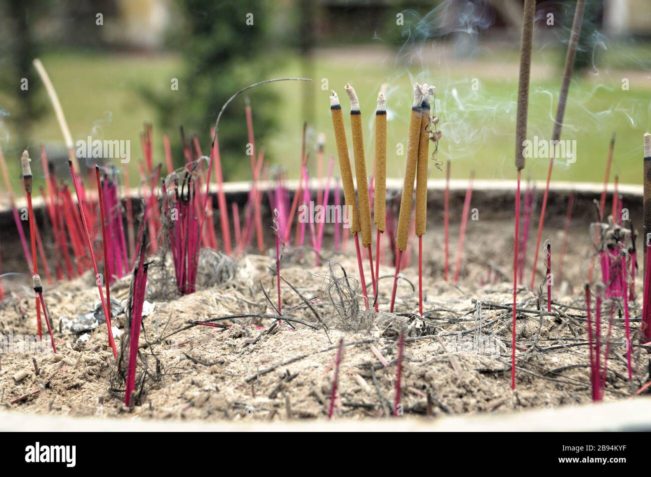 Incense sticks burning at Thien Mu pagoda in Hue, Vietnam Stock Photo