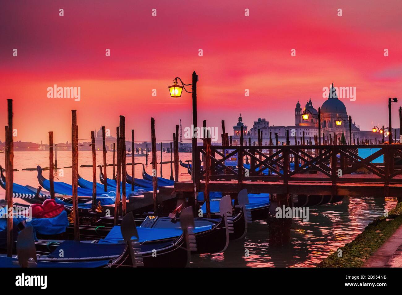 Venice at sunrise with the church of Santa Marie della Salute in the background Stock Photo