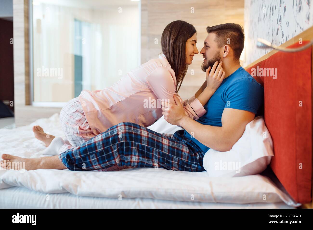Interior bedroom hug relationship couple romance