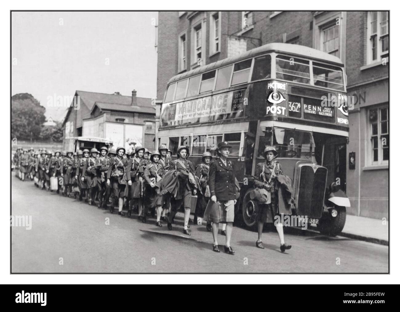 WACs WW2 USA American Eighth Air Force’s first WACs arrive in the UK July 1943. Marching in line past a typical British London Bus. WACs sent overseas were carefully selected from those with high test scores and specialized skills.The Women's Army Corps was the women's branch of the United States Army. It was created as an auxiliary unit, the Women's Army Auxiliary Corps on 15 May 1942 by Public Law 554, and converted to an active duty status in the Army of the United States as the WAC on 1 July 1943 World War II Second World War Stock Photo