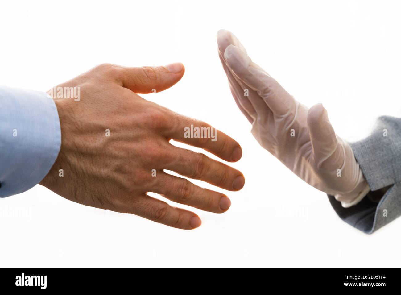 Rejecting Handshake During Coronavirus Pandemic To Stop Pandemic Stock Photo