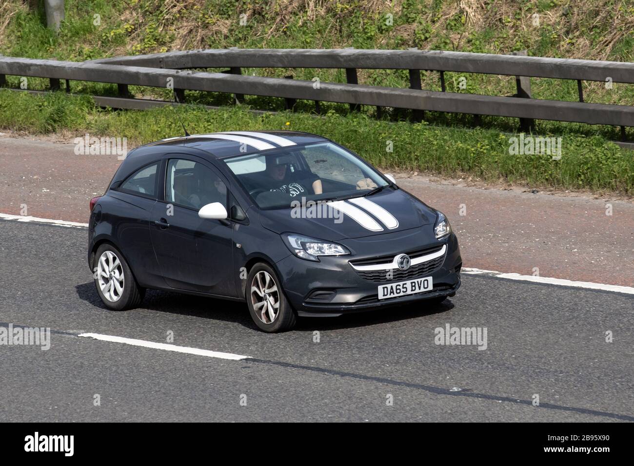 2015 GREY Vauxhall Corsa Sting; UK vehicular traffic, transport, moving vehicles, vehicle, roads, motors, motoring  on the M6 motorway highway Stock Photo