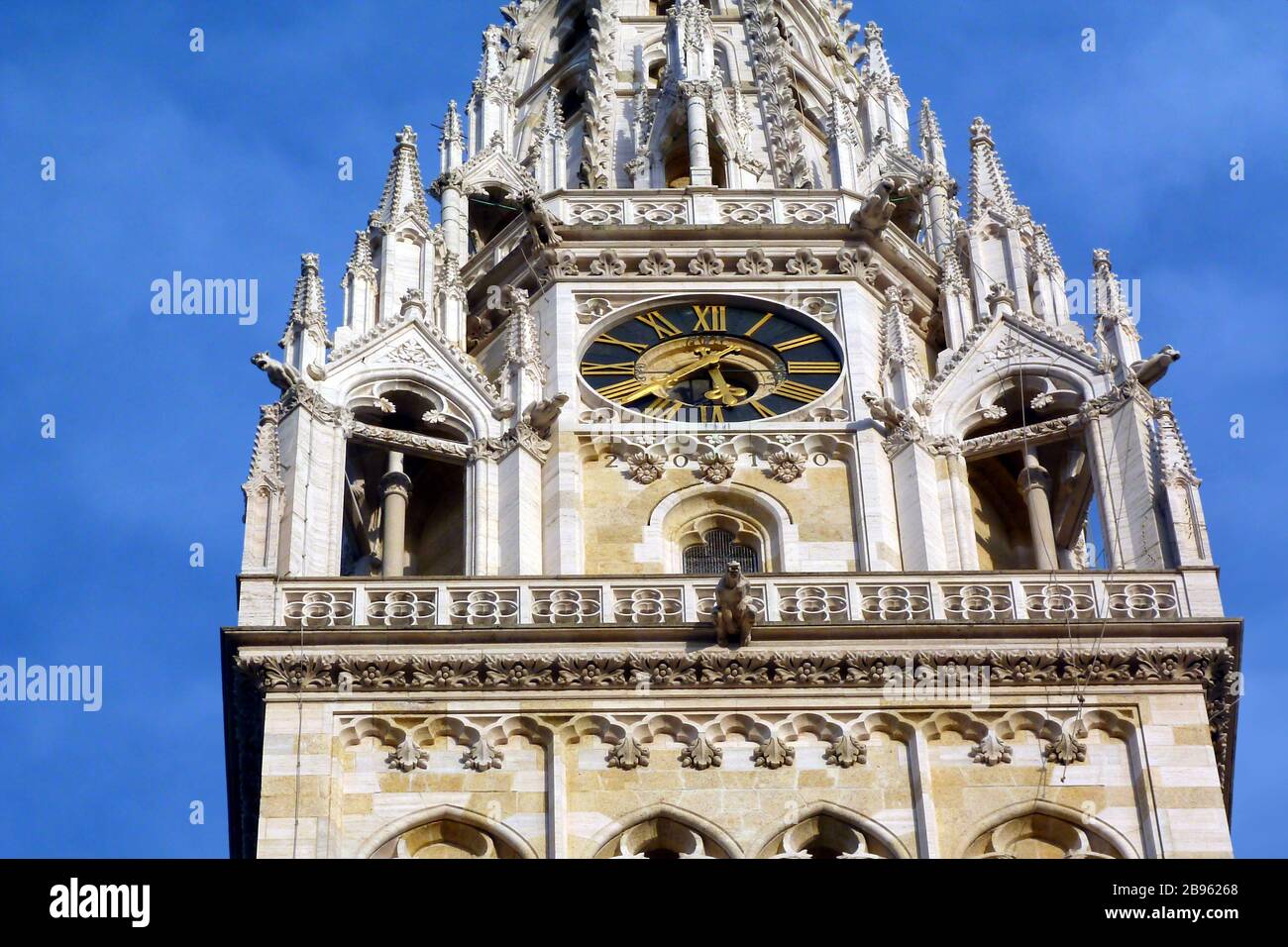 white stone church tower & clock. white ornate carved balustrade. decorative elements. Kaptol hill Zagreb. old architecture. famous Croatian landmark Stock Photo