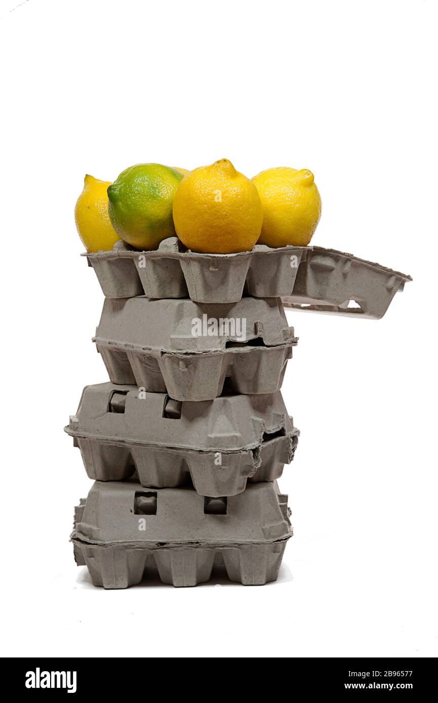 lemons and tower of cardboard boxes Stock Photo