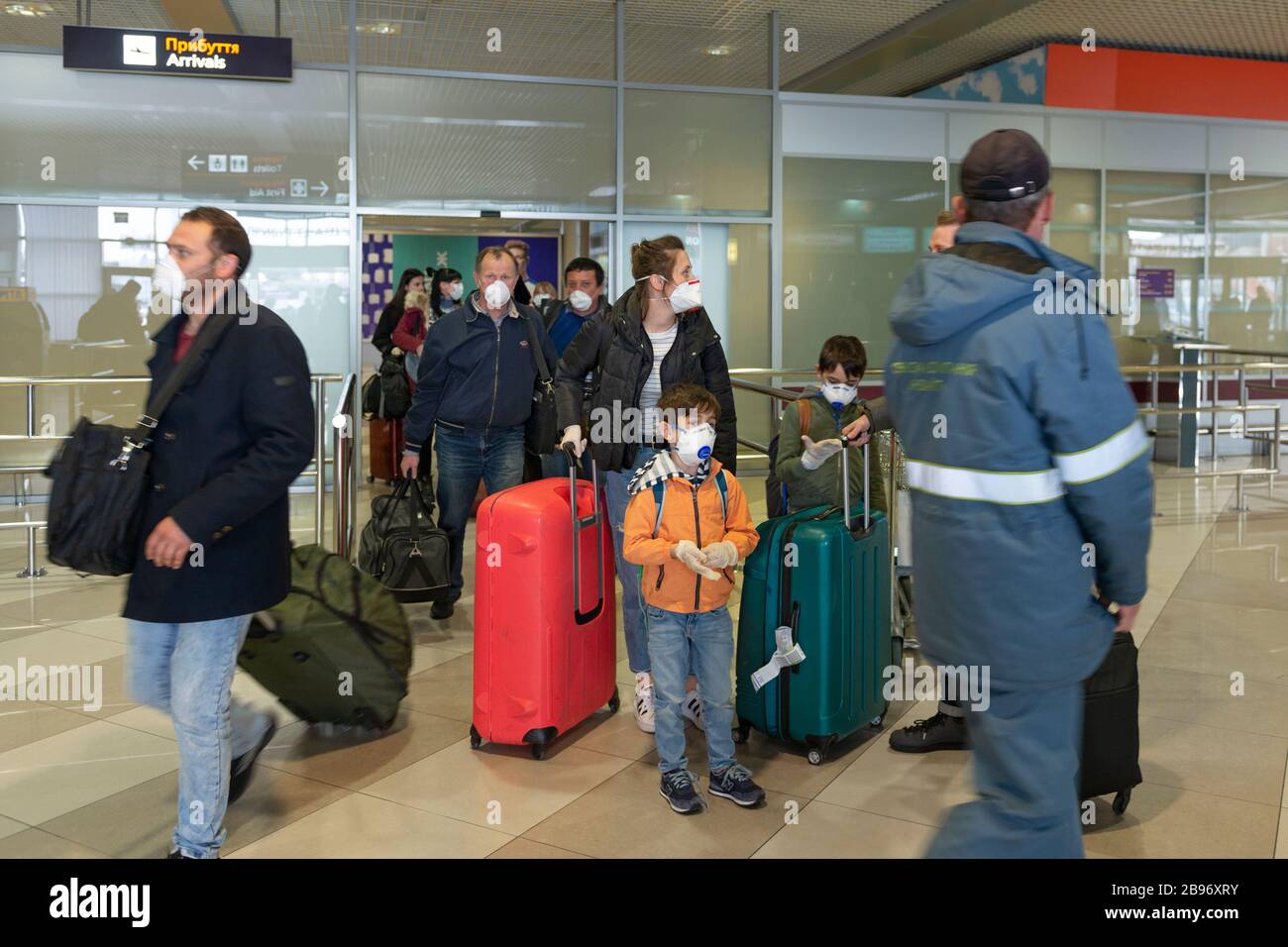 Boryspil airport, Ukraine, March 22 2020, arrivals gate, citizens in medical masks returning back home from abroad by special flights during covid-19 Stock Photo