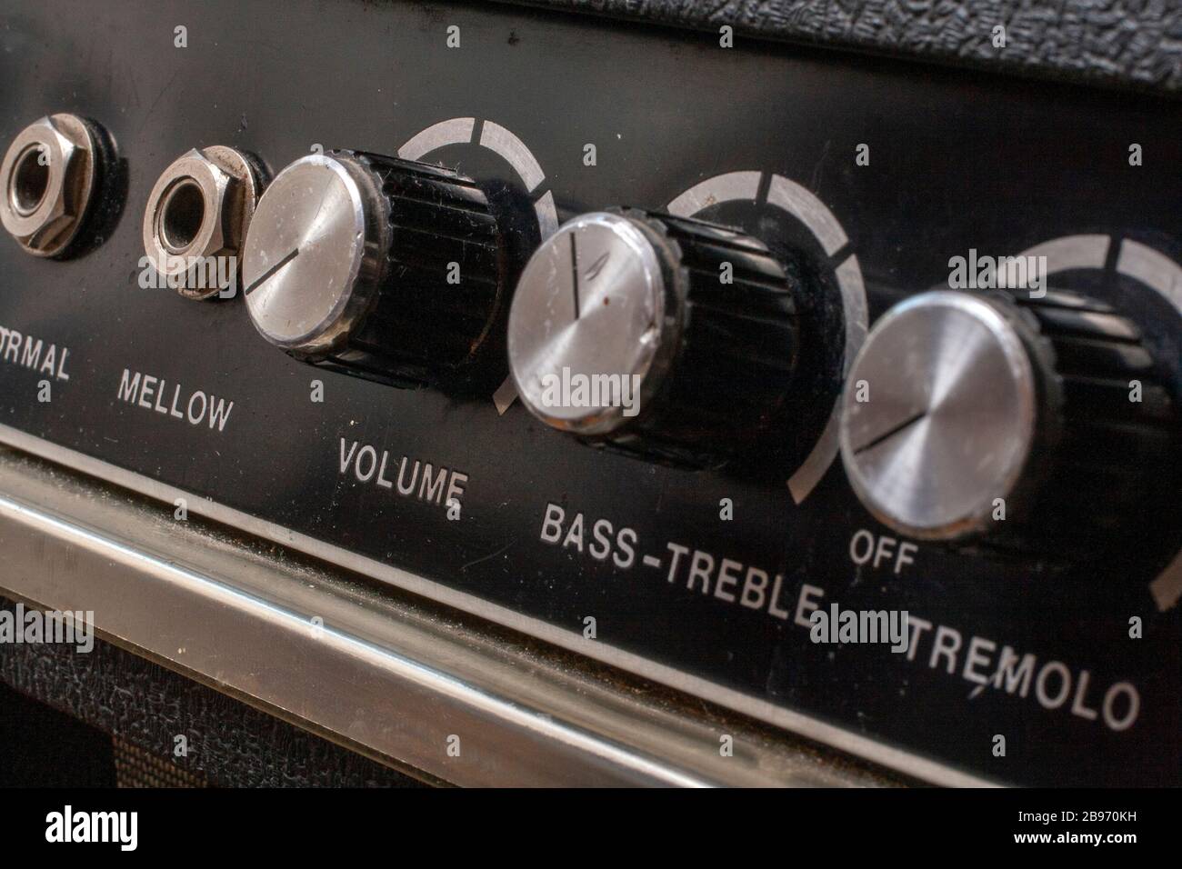 Close up shot of an old electric guitar amplifier knobs Stock Photo - Alamy