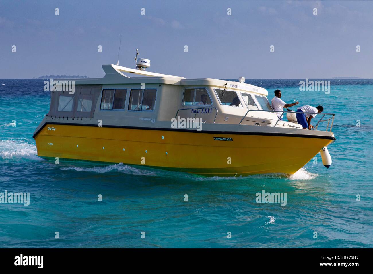 Typical speedboat for transfer of guests between islands and airport, Indian Ocean, Summer Island, North Male Atoll, Maldives Stock Photo