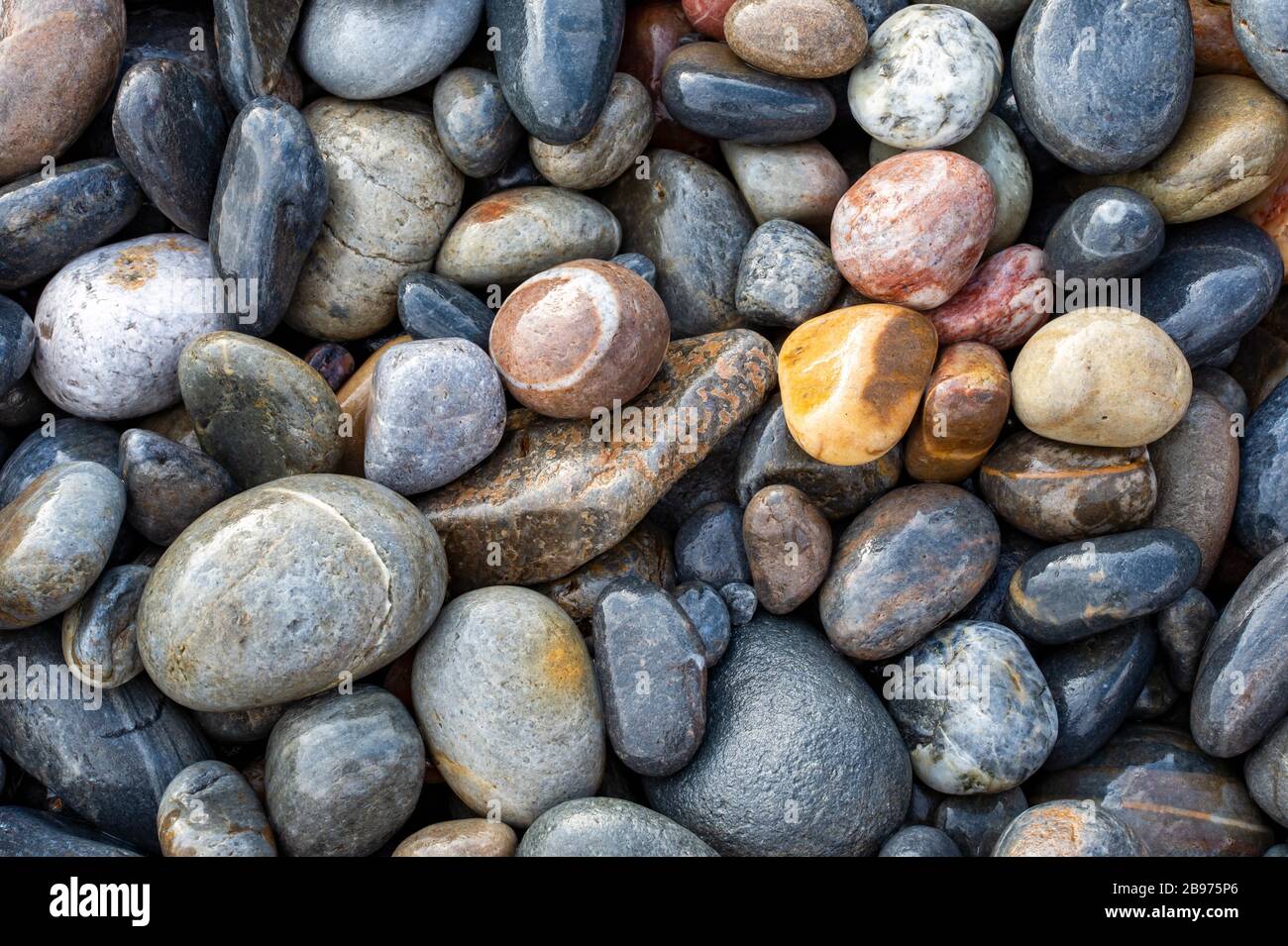 Colourful round cut stones; Crete; Greece Stock Photo