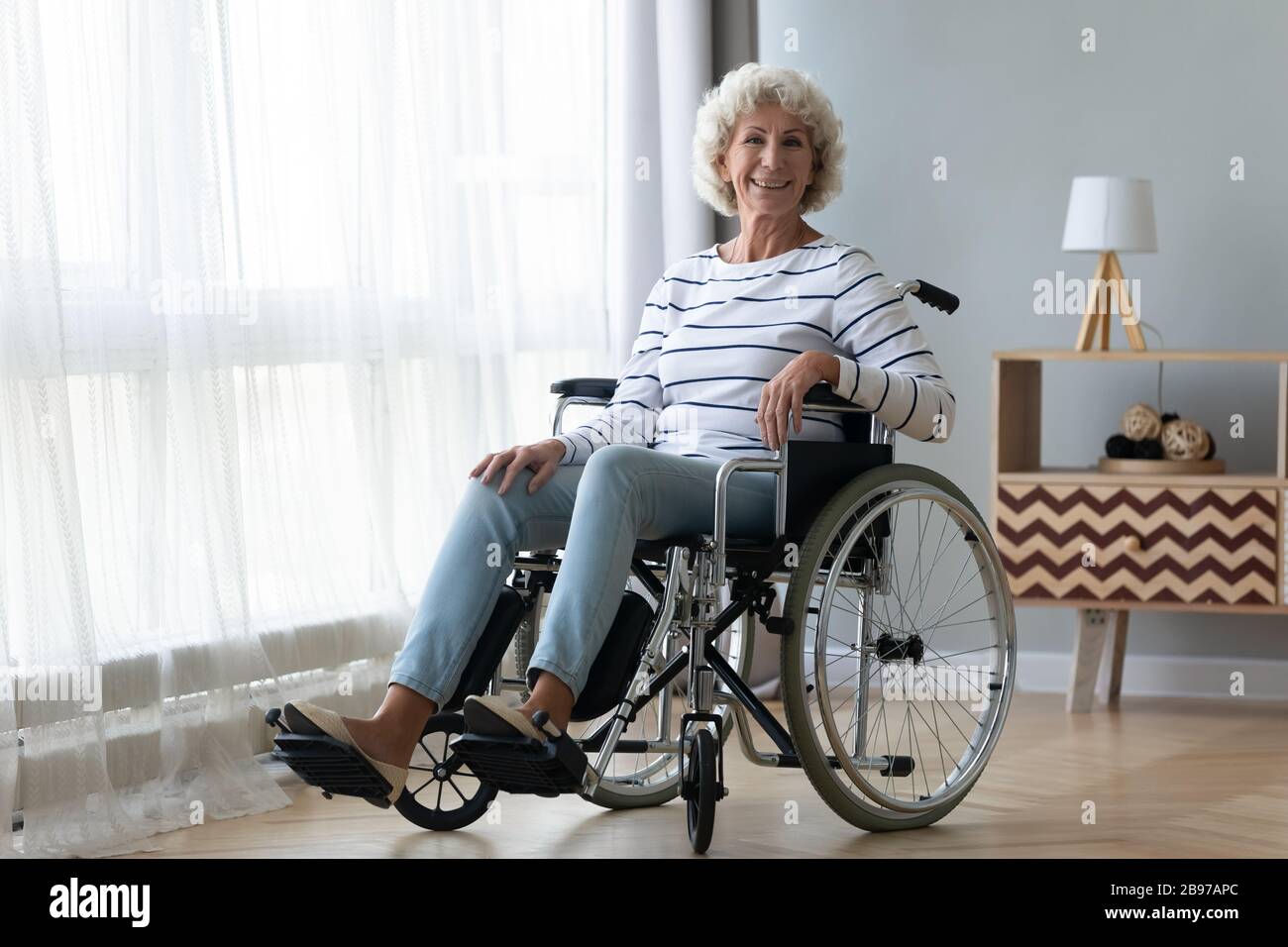 Elderly person in wheelchair hi-res stock photography and images - Alamy