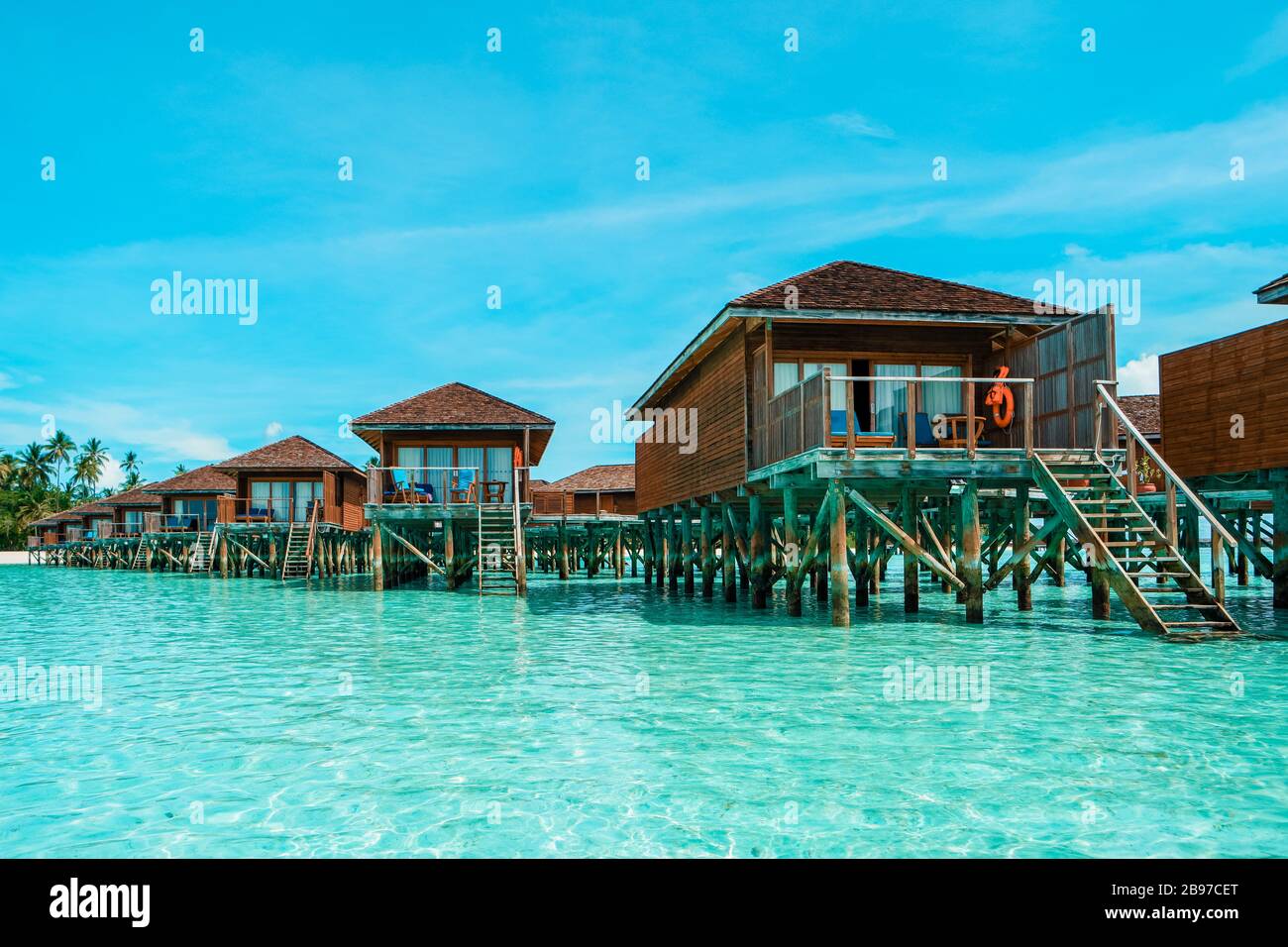 Maldives tropical Island, beautiful isolated luxury water bungalows Maldives in the blue green ocean of the maldives Stock Photo