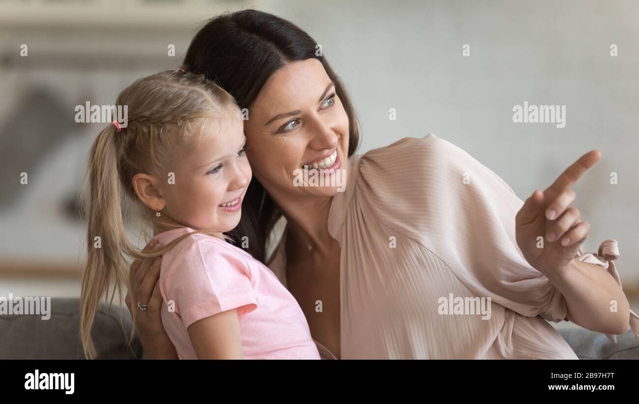 Happy mom and daughter enjoy free time together Stock Photo
