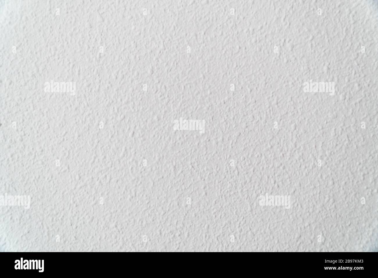 Seamless white textured paper background - texture pattern for continuous replicate. Stock Photo