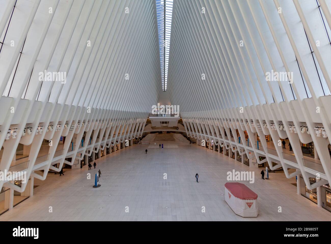 Very few passengers in the World Trade Center Oculus in New York City because of COVID-19, Coronavirus. Stock Photo