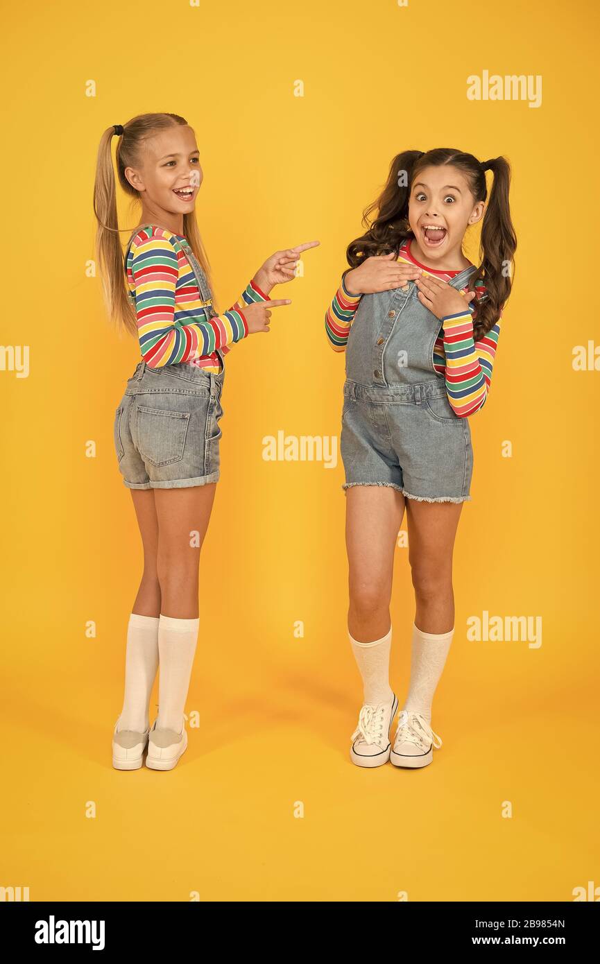 Best friends. Modern fashion. Kids fashion. Little girls wearing rainbow  clothes. Happiness. Girls long hair. Cute children same outfits  communicating. Trendy and fancy. Emotional kids. Fashion shop Stock Photo -  Alamy