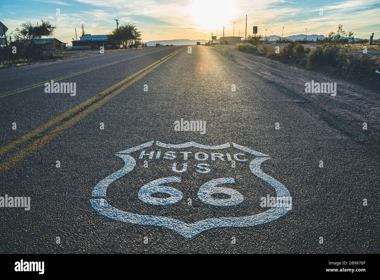 Historic US Route 66 highway sign on asphalt Stock Photo