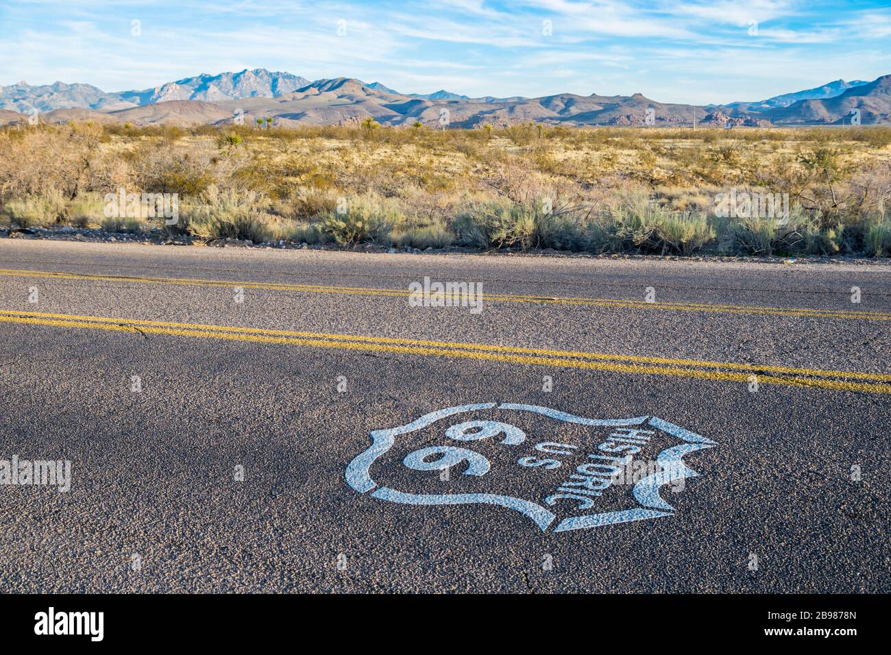 Historic US Route 66 highway sign on asphalt Stock Photo