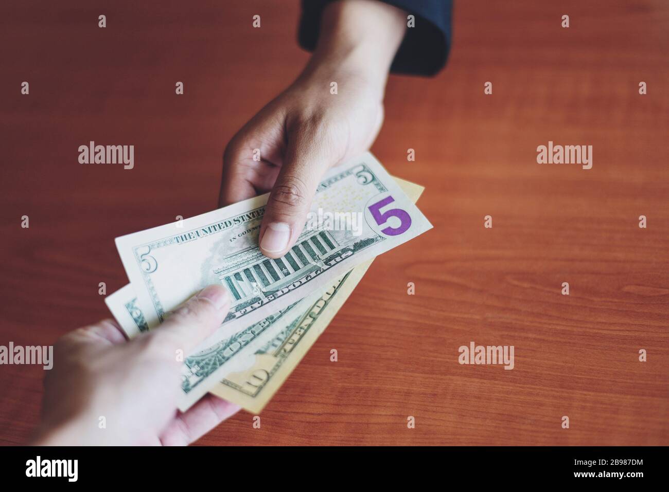 Business man give money bribe concept / person hands man giving money