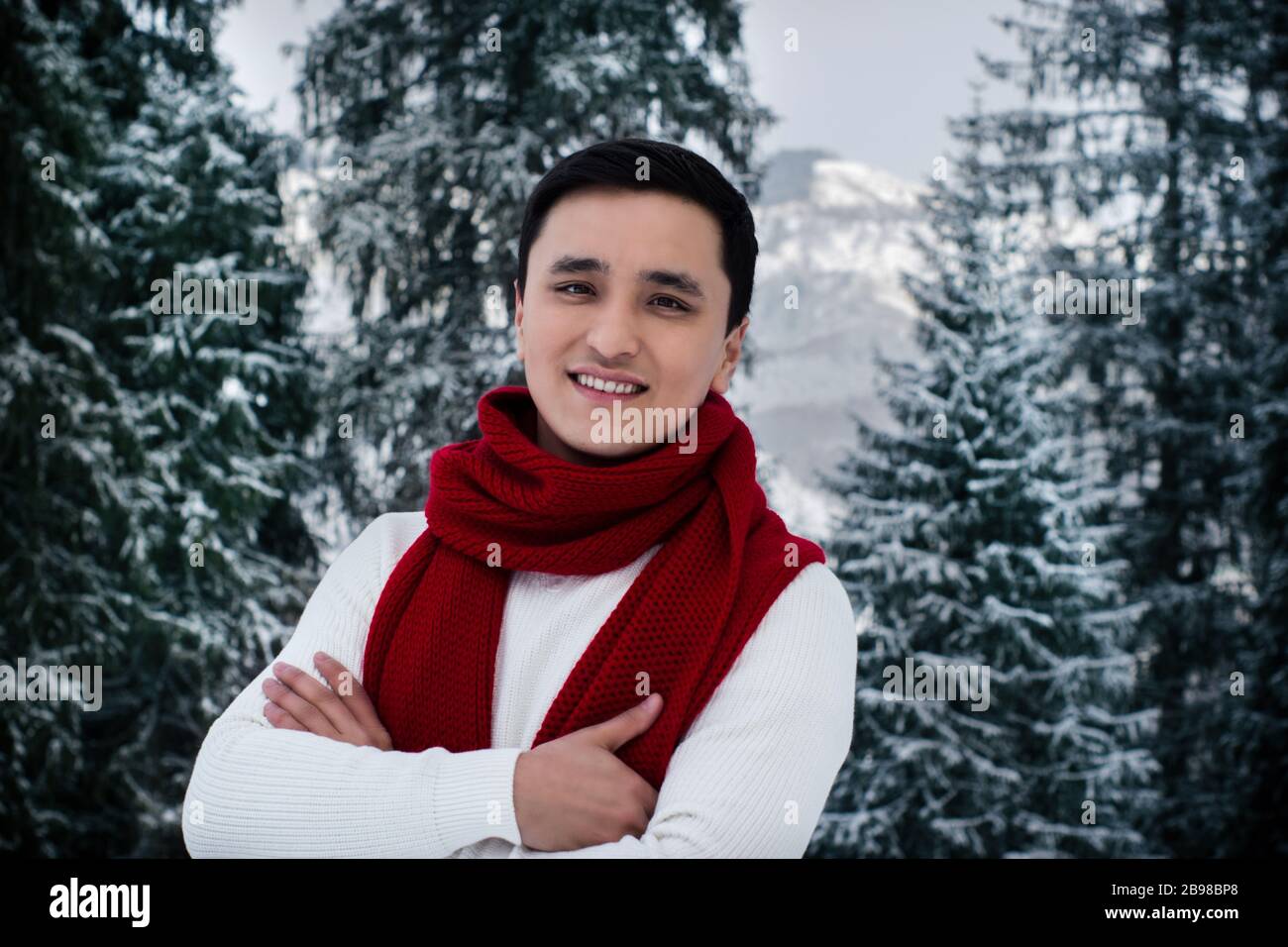 happy asian young man with winter clothes Stock Photo - Alamy