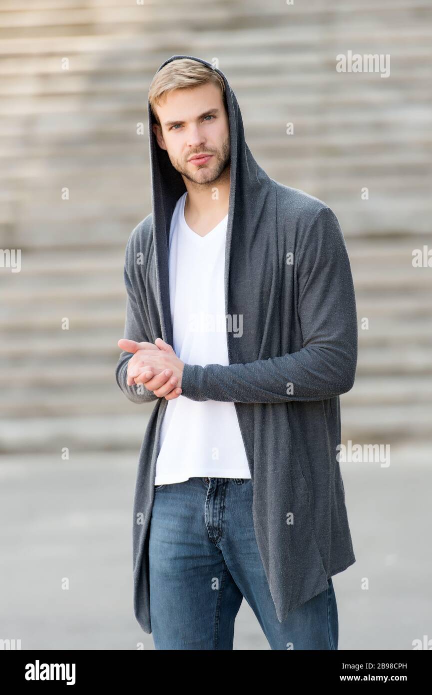 Grind Multiplication Caroline handsome man with hood standing in urban city interior. informal style  clothing. Fashionable young model man. Mystery man posing with hoodie.  young street man with hood. Incognito Boy Stock Photo - Alamy