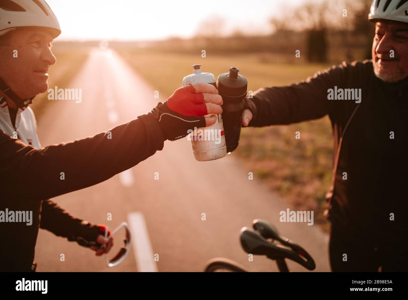 Middle aged man on road bike hi-res 