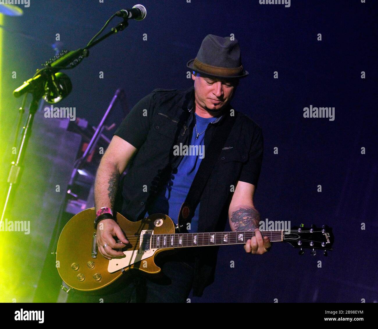 Train guitarist Jimmy Stafford performs with the rest of the band at